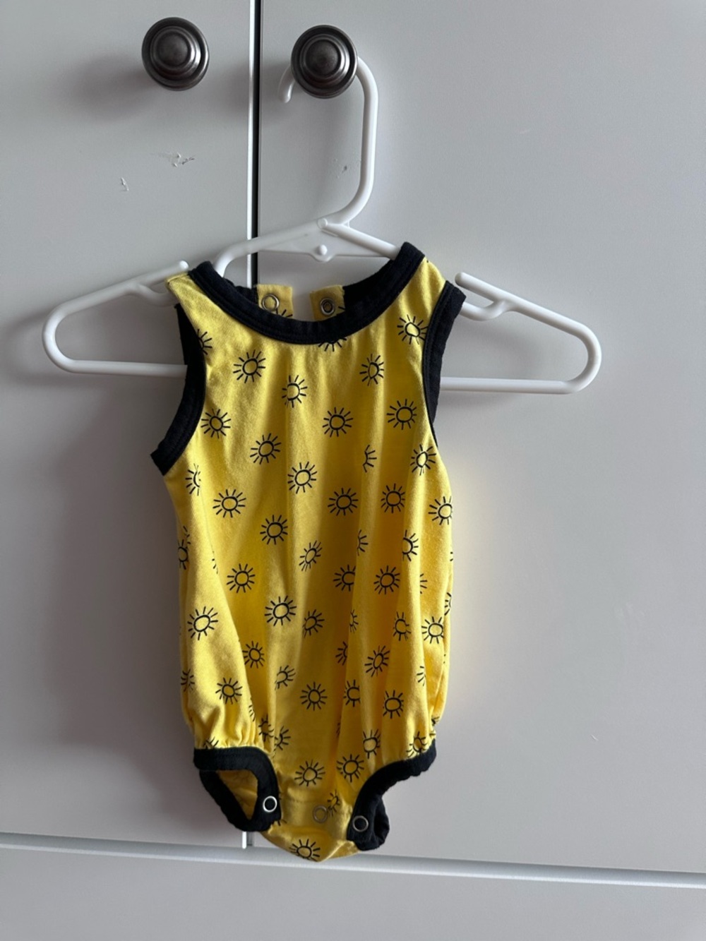 kate quinn Yellow Sun Motif Baby One-Piece with Black Trim